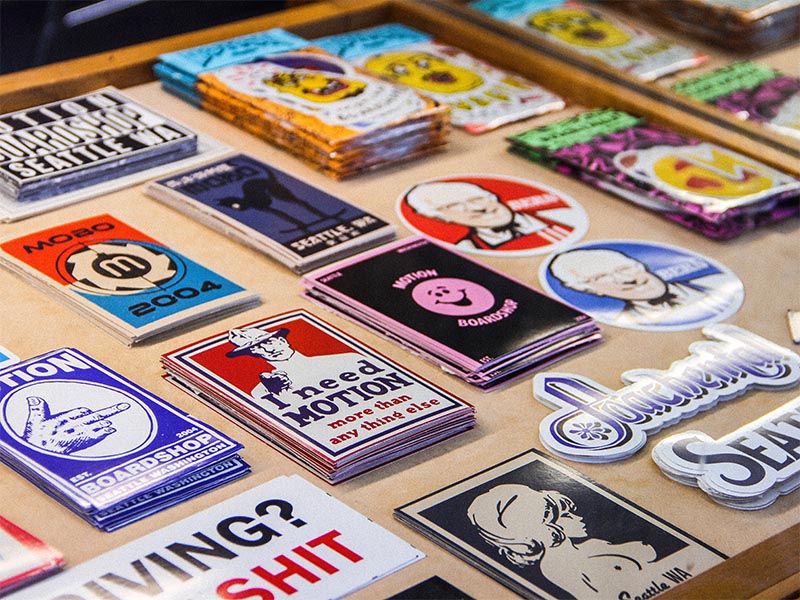 A variety of stickers printed by the in-house artists at Motion Printshop. Photo by Sean McAllister